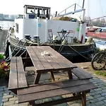 Houseboat Captain\'S Quarters In Harbour Amsterdam