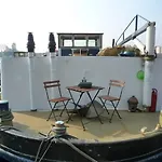 Houseboat Captain\'S Quarters In Harbour Amsterdam